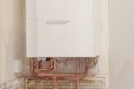 Boiler installations in Liverpool on domestic properties. One contains a vertical flue to the roof.
